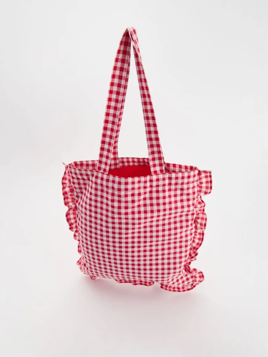Materiałowa torba shopper z haftem i falbanką