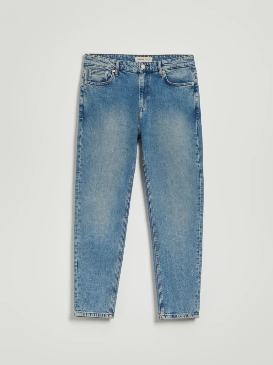 Niebieskie jeansy carrot fit z efektem sprania