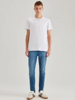Niebieskie jeansy slim fit z przetarciami