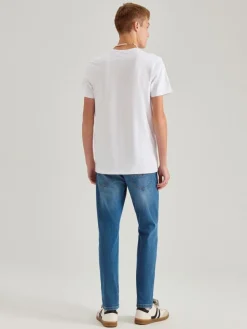 Niebieskie jeansy slim fit z przetarciami