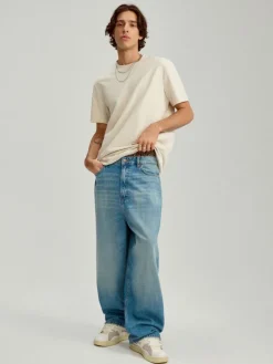 Niebieskie jeansy super baggy fit z efektem sprania