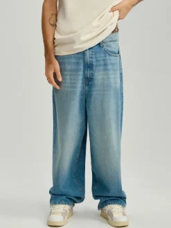 Niebieskie jeansy super baggy fit z efektem sprania