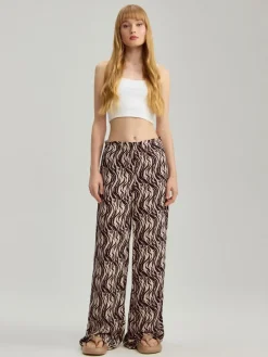 Spodnie wide leg mid waist ze wzorem w zebrę