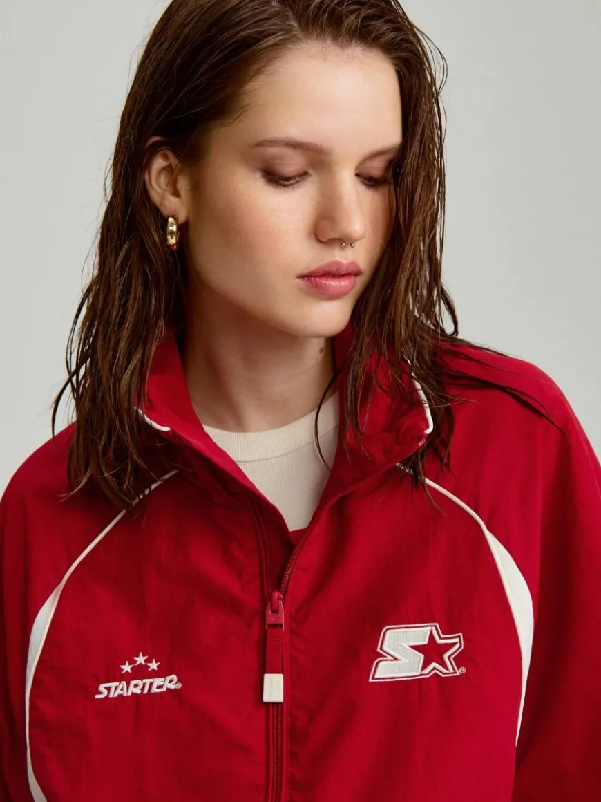 Sportowa czerwona kurtka oversize na stójce z motywem Starter
