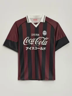 Sportowa koszulka oversize w paski z nadrukiem Coca-Cola