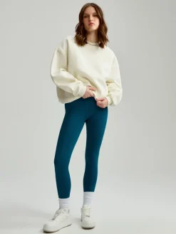 Turkusowe legginsy mid waist