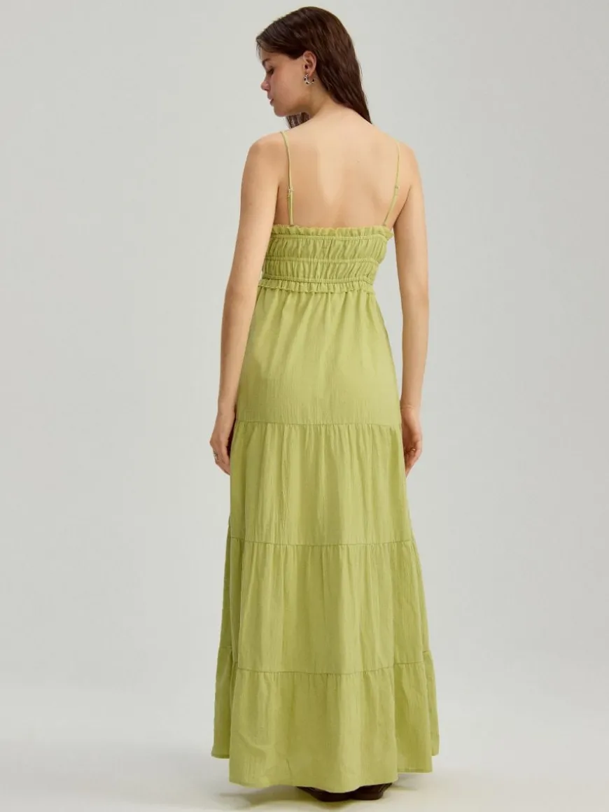 Zielona sukienka maxi fit&flare z kieszeniami i falbanami