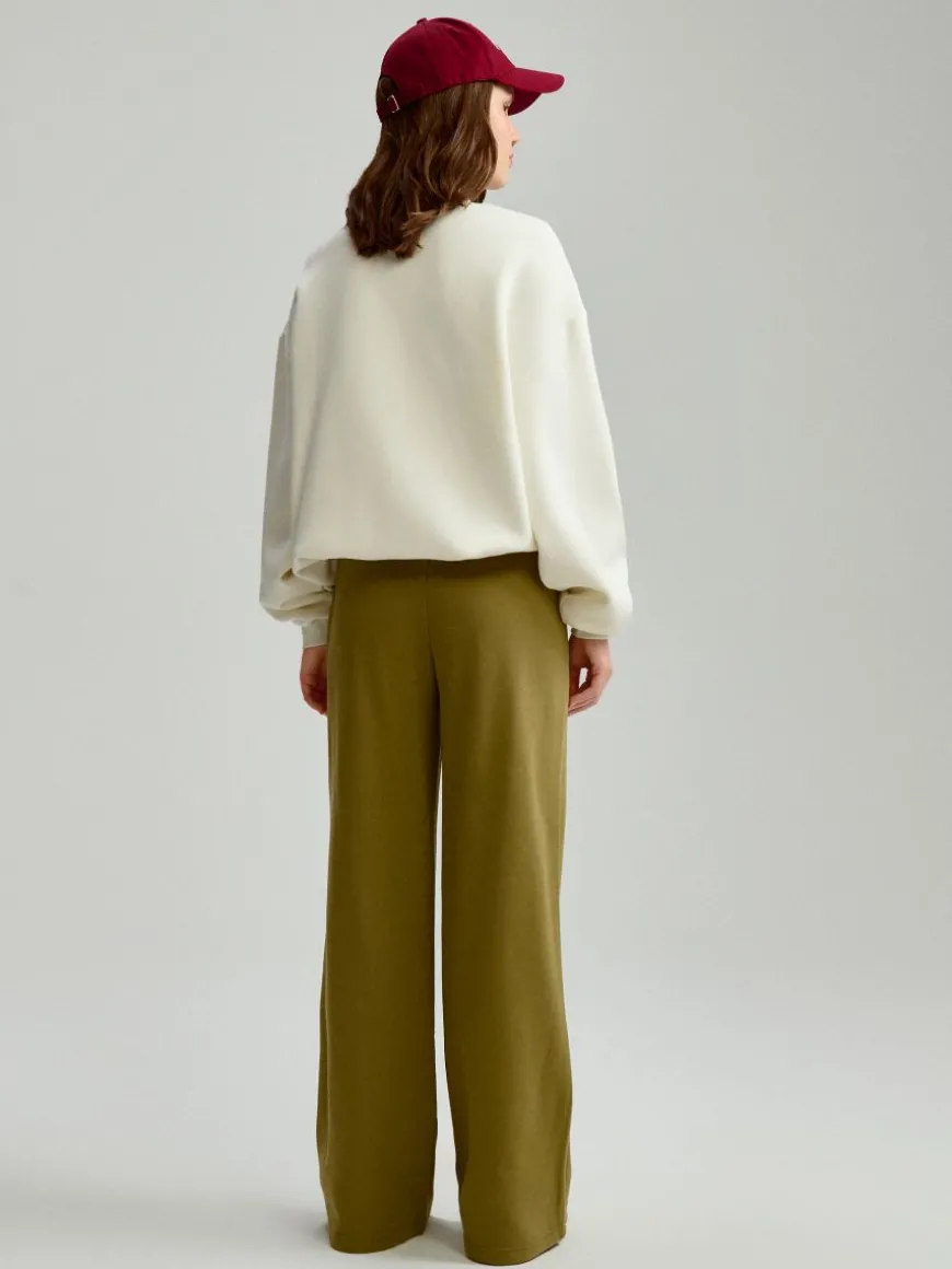 Zielone spodnie dresowe mid waist wide leg